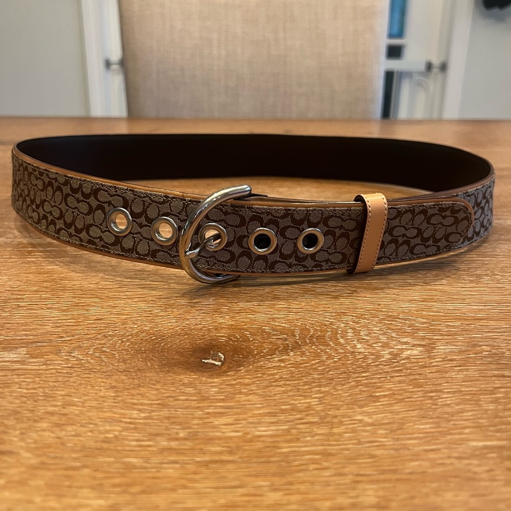 Tan and brown Coach monogram belt, like new.